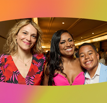 2026 Distinction Awards - three smiling people at an awards event